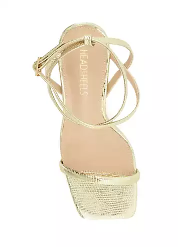 Head Over Heels By Dune Matchmaker Gold Reptile Asymmetric Heeled Sandals | Grattan