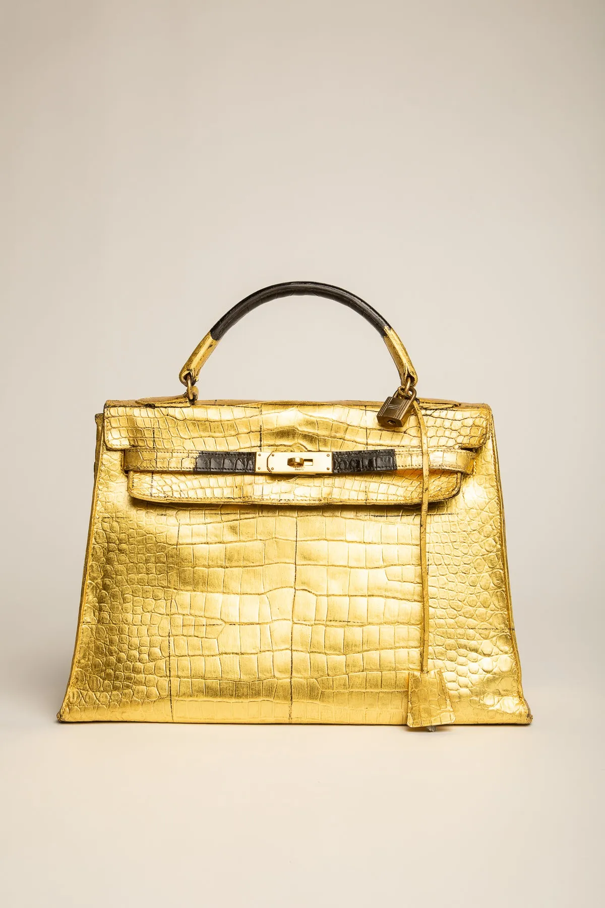 HERMS | KELLY GOLD LEAF BAG